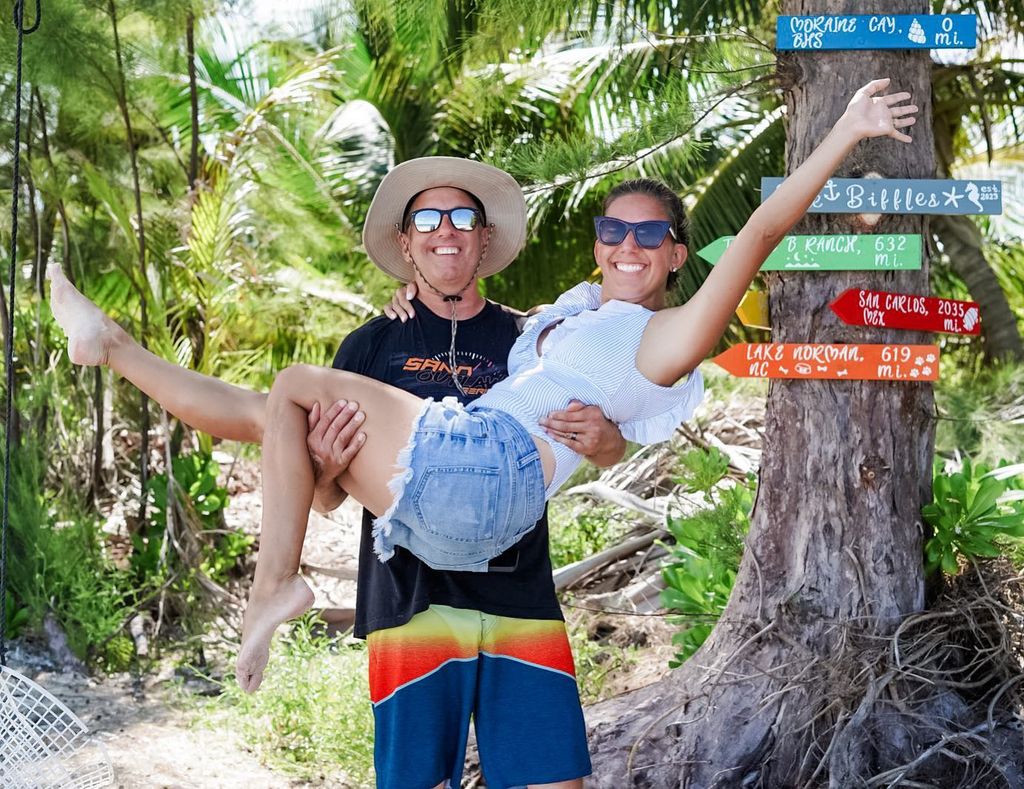 photo of greg biffle holding wife cristina