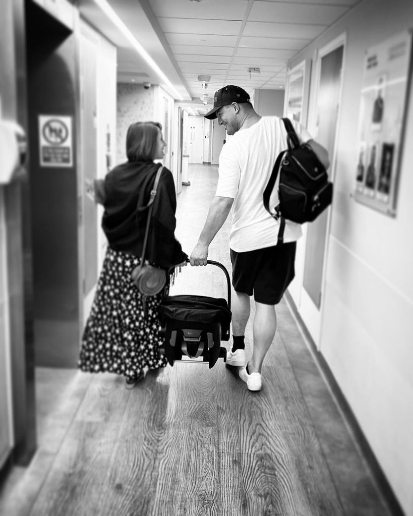 janette and aljaz leaving hospital with baby Lyra 