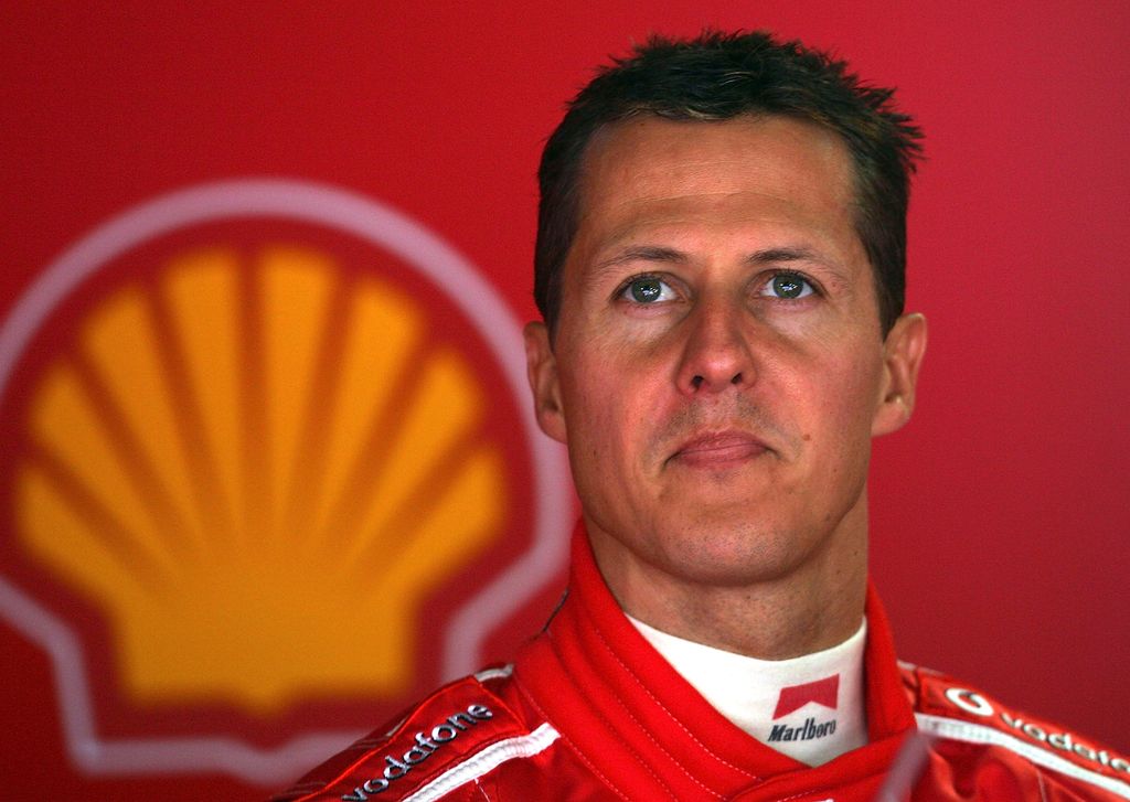 Michael Schumacher of Germany and Ferrari looks on in the Ferrari pit during the qualifying session for the Monaco Formula One Grand Prix on May 22, 2005 in Monte Carlo, Monaco