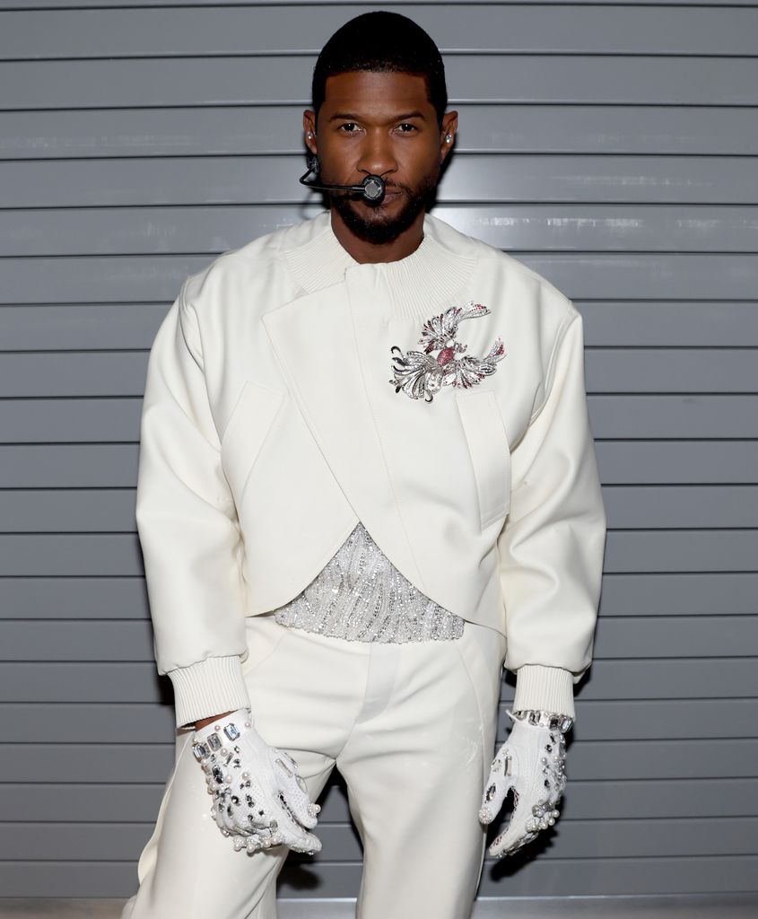 Usher poses backstage during the Apple Music Super Bowl LVIII Halftime Show