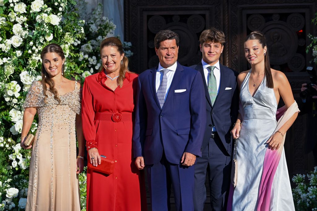 Alexia of Greece and Carlos Morales with their children, Ana Maria, Amelia and Carlos at he wedding ceremony of Princess Theodora and Matthew Kumar 