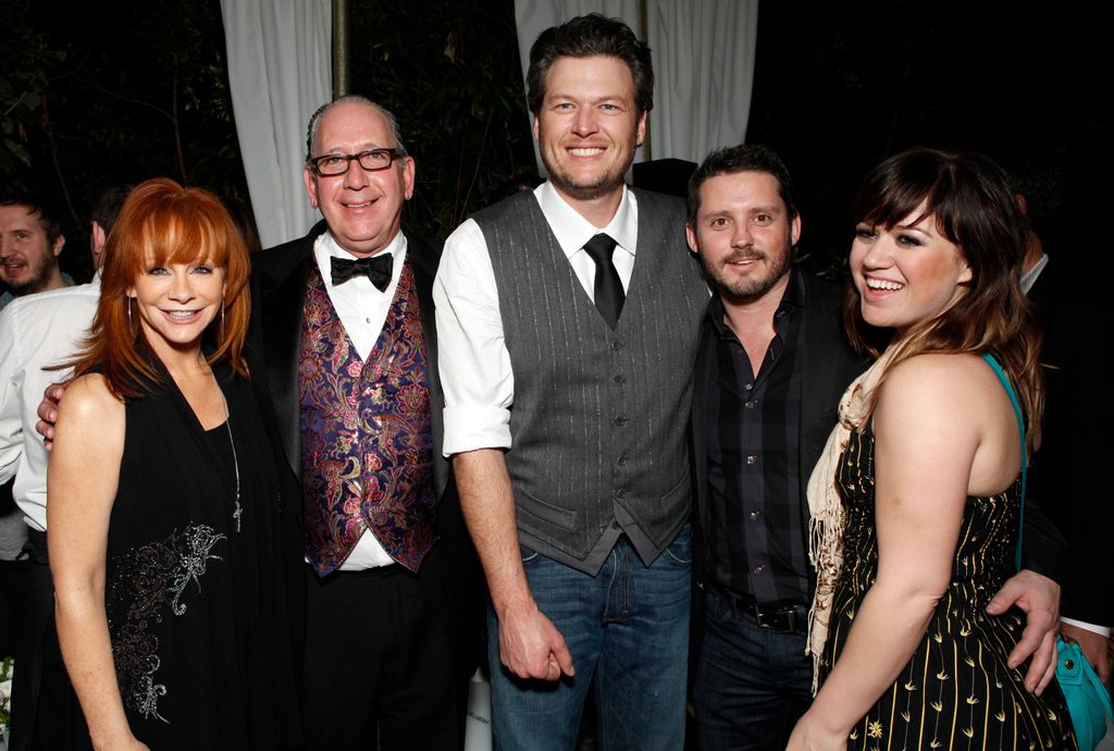 Reba McEntire, Warner Music Nashville's President  and CEO John Espositio, Blake Shelton, Brandon Blackstock and Kelly Clarkson attend Warner Music Group Grammy Celebration hosted by InStyle at Chateau Marmont on February 12, 2012 in Los Angeles, Californ