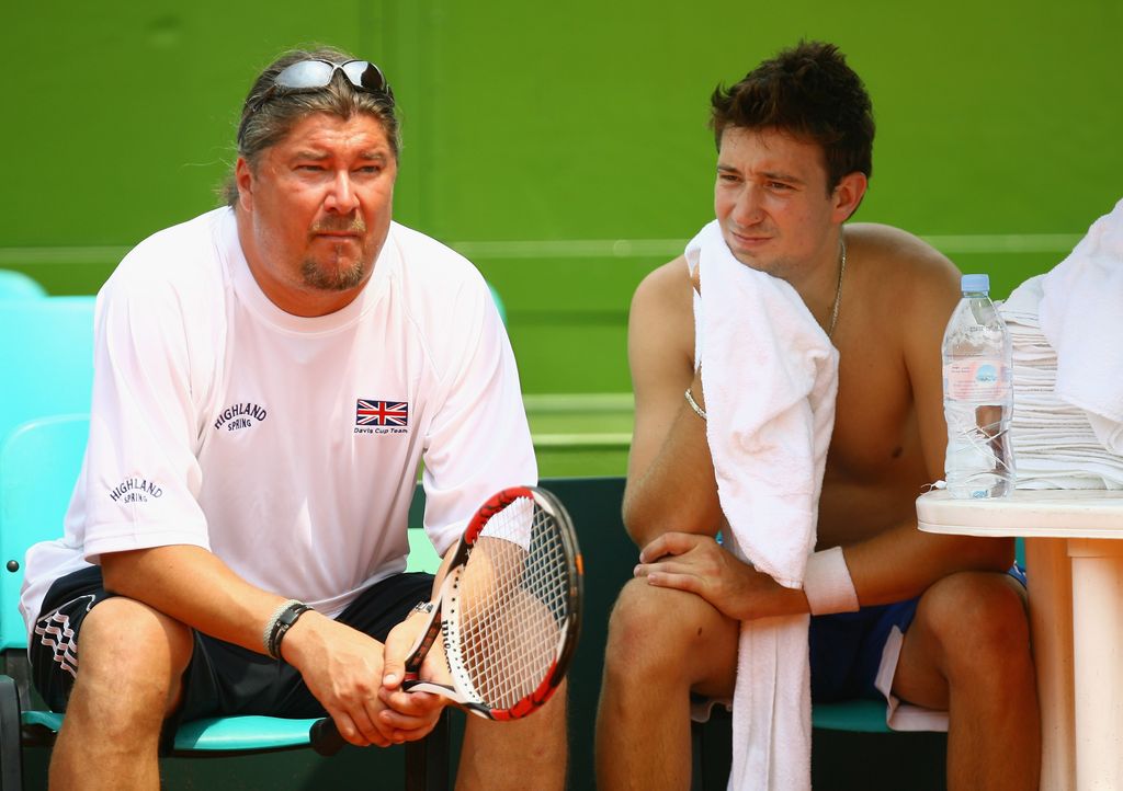 Peter Lundgren sitting with a shirtless Alex Bogdanovic