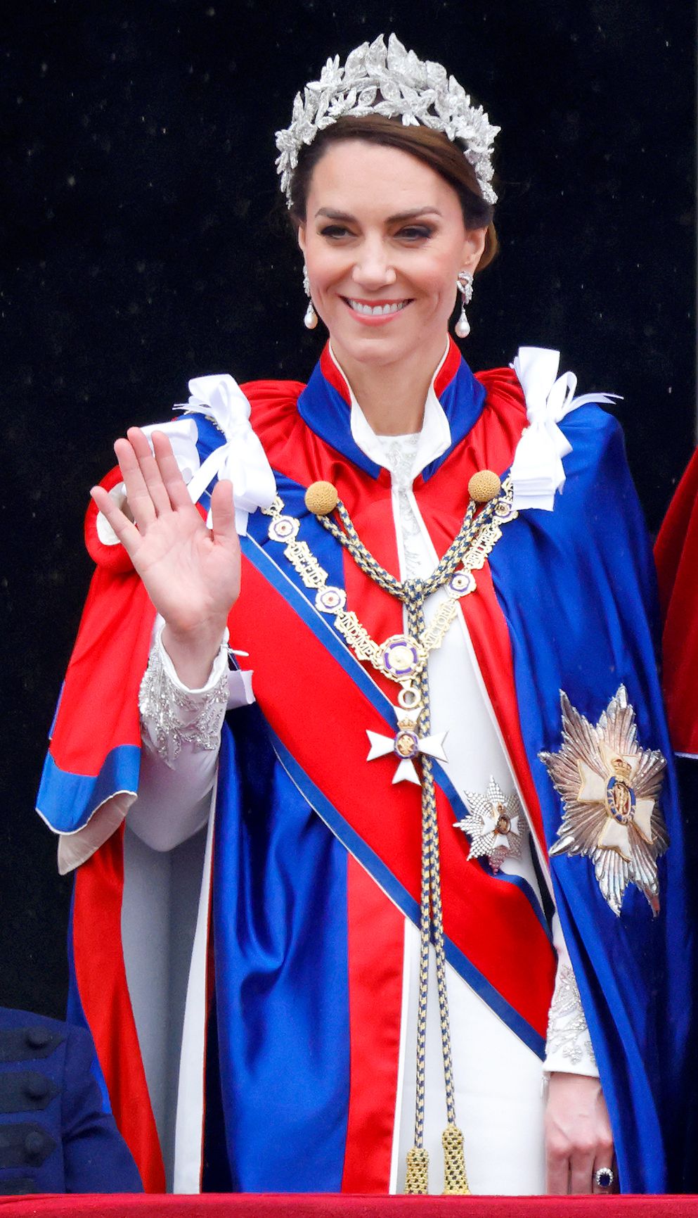 Princess Kate waving at the Coronation from the balcony