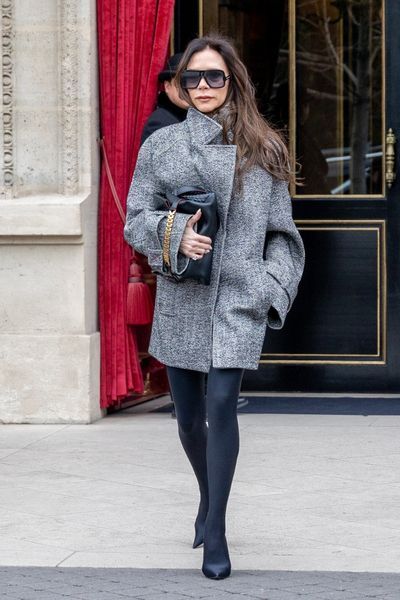 Victoria Beckham and Nicola Peltz wear matching handbags at Paris ...