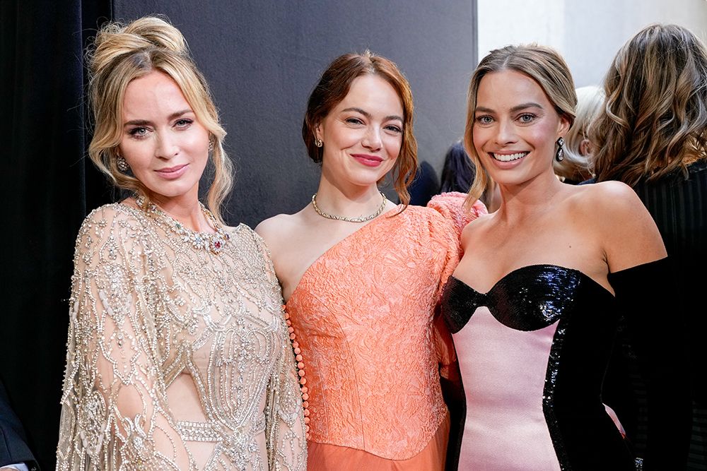 Emily Blunt, Emma Stone and Margot Robbie pose together at the BAFTAs 