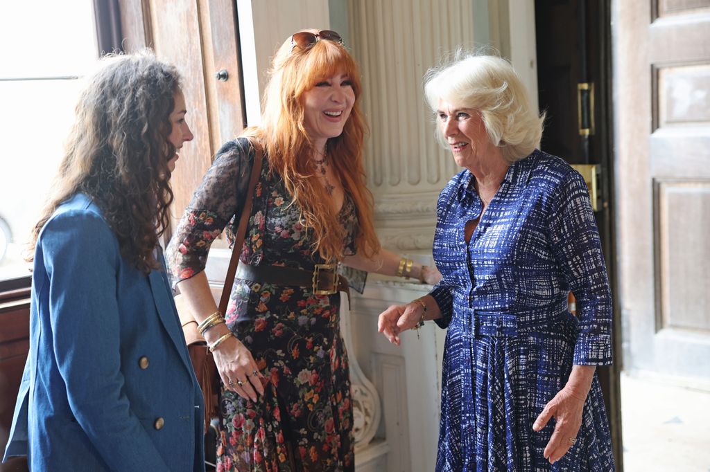 Queen Camilla (R) speaks to Rose Cholmondeley (L) and Charlotte Tilbury (C) as she attends the final day of the Badminton Horse Trials 202
