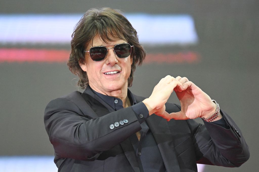 Tom Cruise poses for a photo during a red carpet event for the film "Mission: Impossible - The Final Reckoning" in Seoul