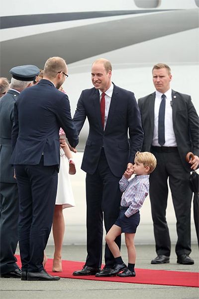 prince george kissing prince william hand