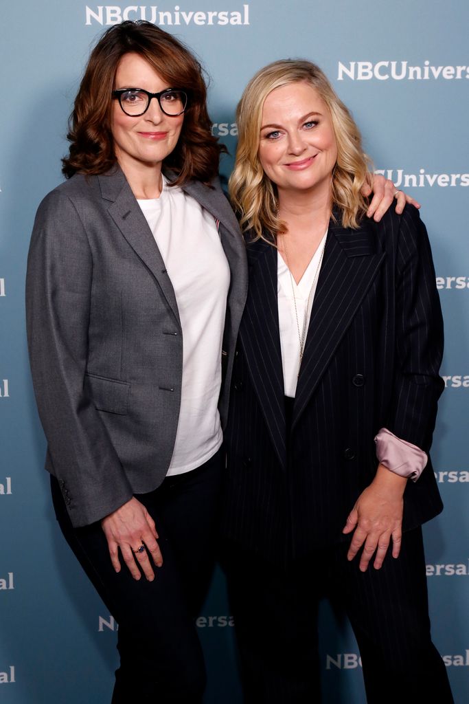 Tina Fey and Amy Poehler pose 