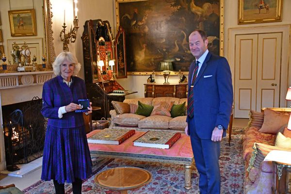 camilla receives brooch