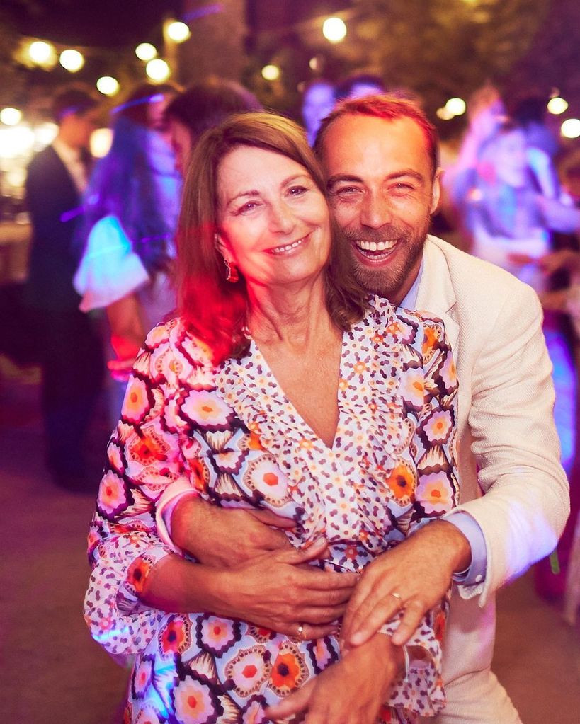 James Middleton hugging mother Carole Middleton at his wedding reception