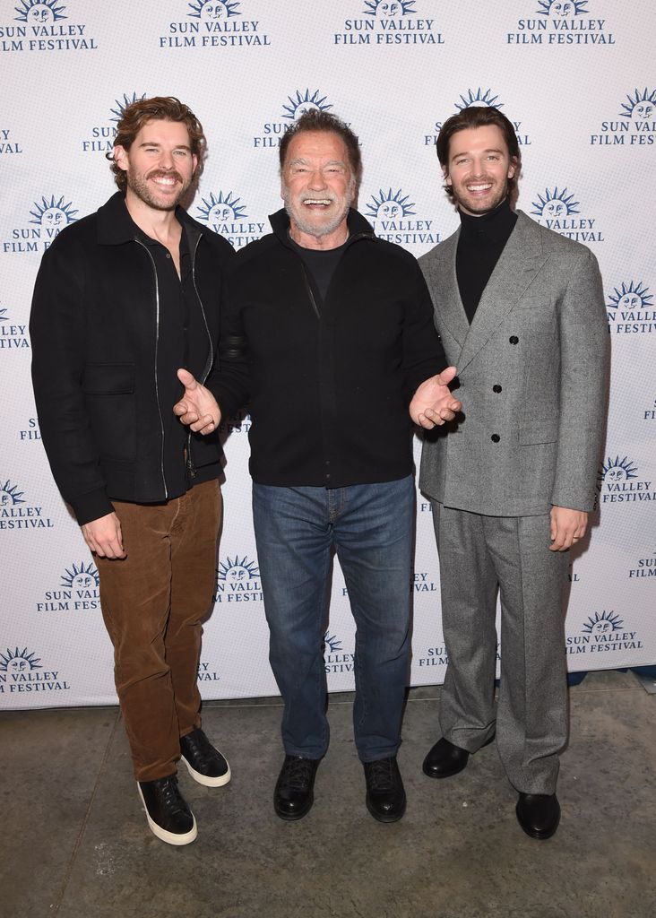Christopher Schwarzenegger, Arnold Schwarzenegger, and Patrick Schwarzenegger at the 2025 Sun Valley Film Festival red carpet