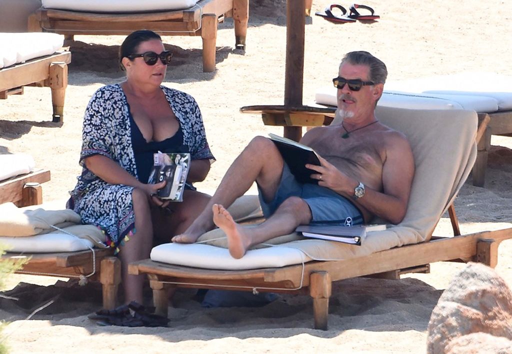 Pierce Brosnan and wife Keely on a beach vacation 