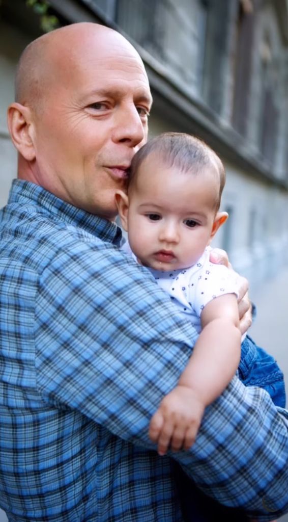 Bruce Willis kisses his daughter Mabel's head in a sweet throwback photo