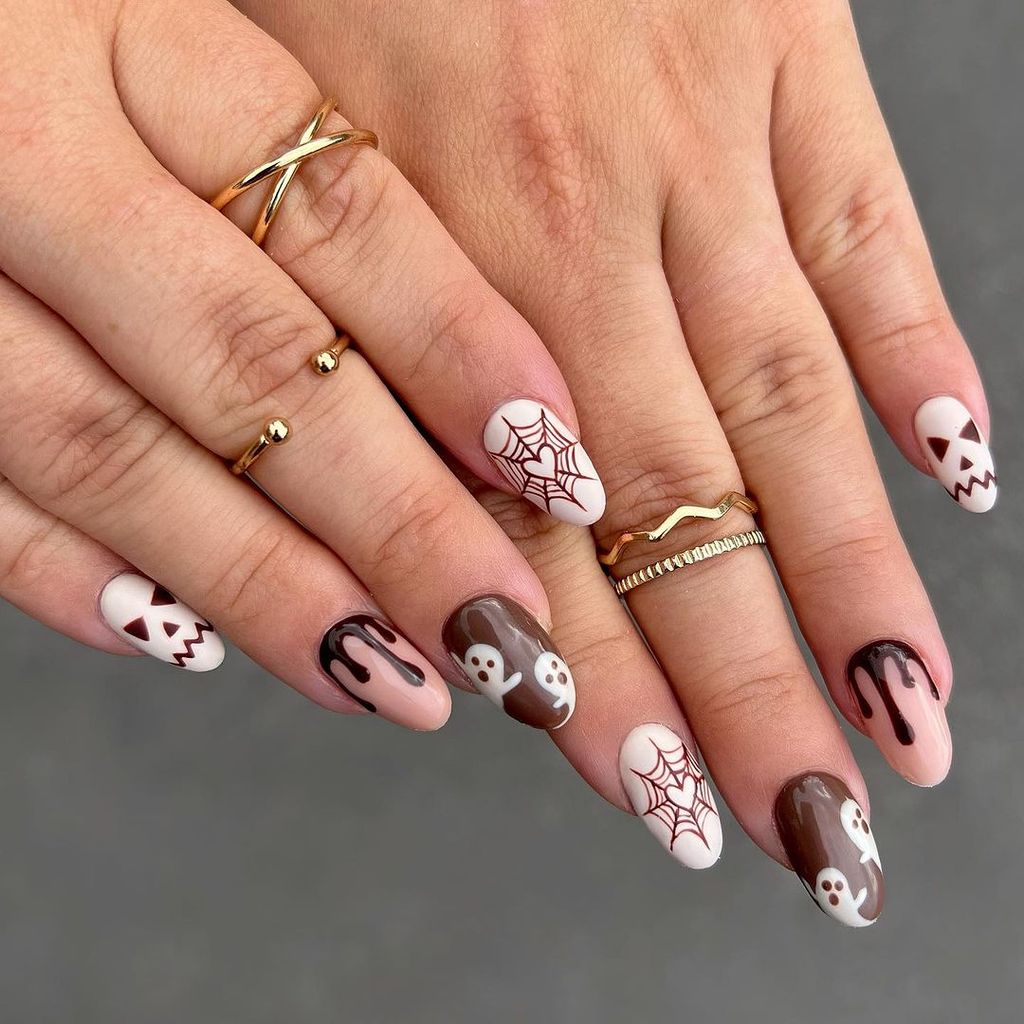 Brown Halloween nails with webs and ghosts 