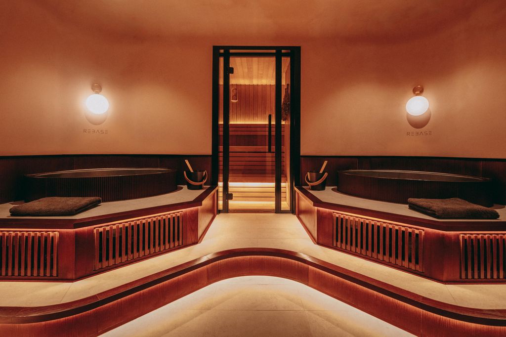 Inside the private ice bath and infrared sauna suite at Rebase