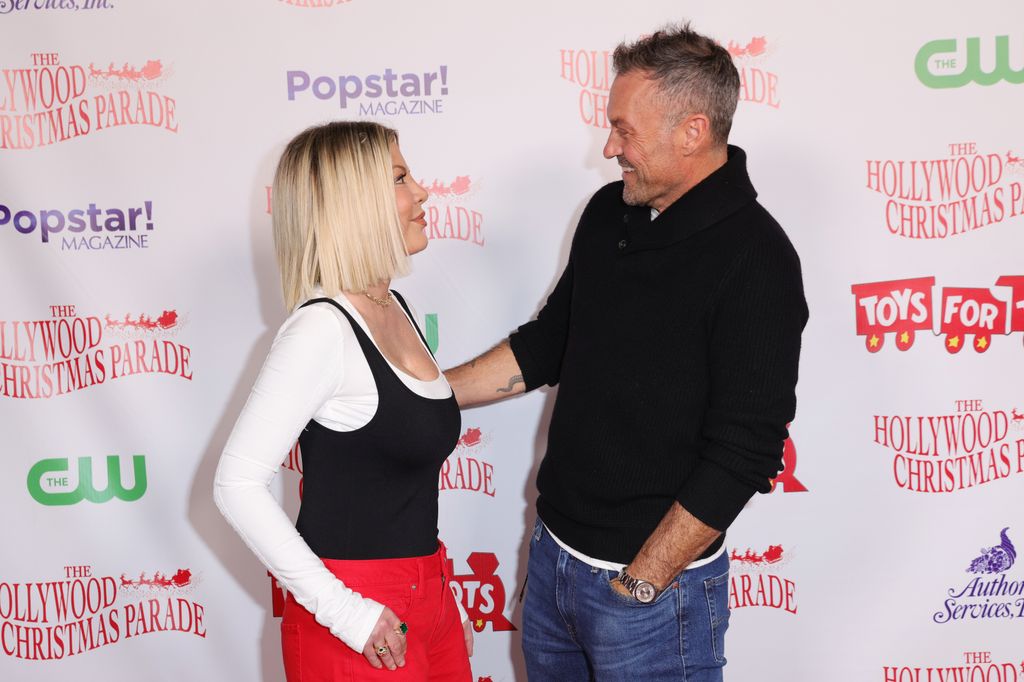 Tori Spelling and Brian Austin Green at The 2025 Hollywood Christmas Parade 