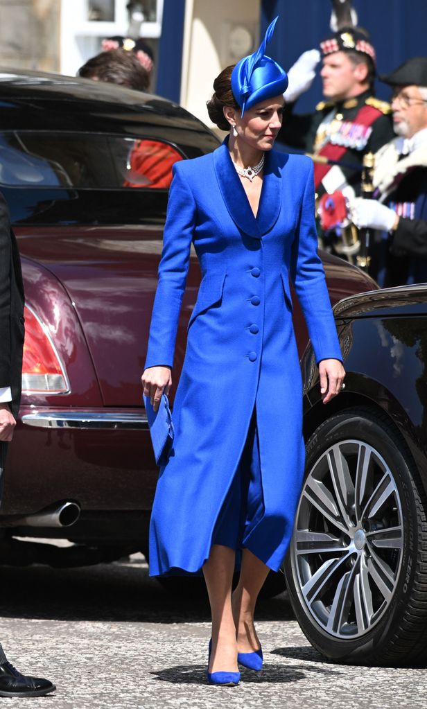 kate middleton wears a blue coat dress