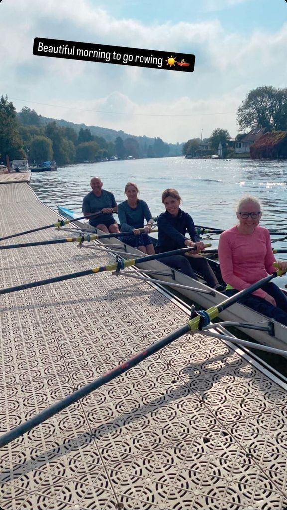 Carrie posed alongside her rowers