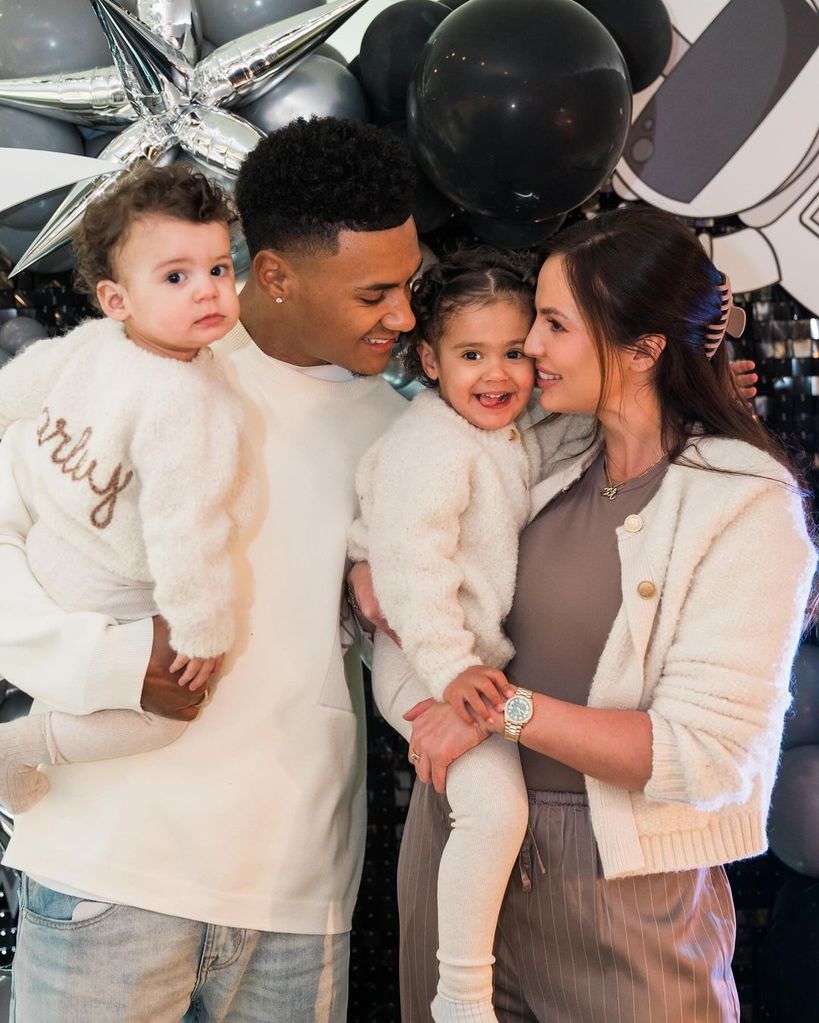 Ollie Watkins with his girlfriend Ellie and their two kids