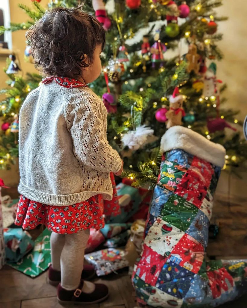 Will Kirk baby daughter pictured by Christmas tree with handmade stocking 