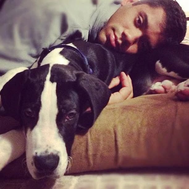 russell wilson hugging dog prince