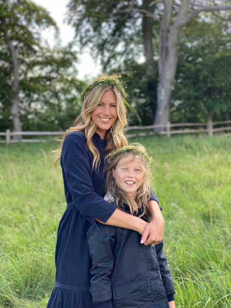 Ben Fogle's wife hugging daughter Iona in a floral headband
