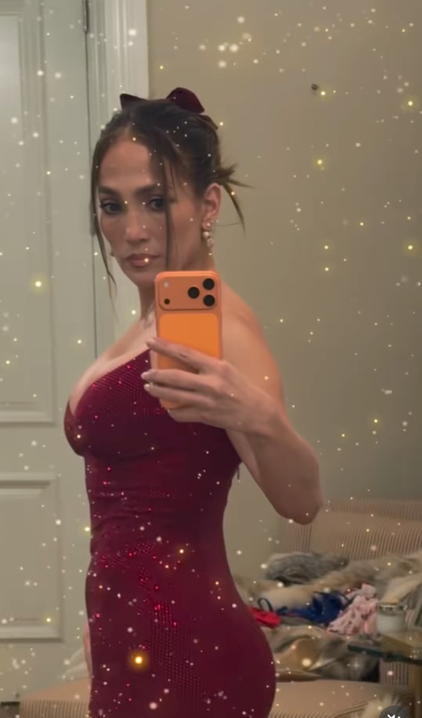 JLo flaunted her physique in an incredible deep-red bodycon dress