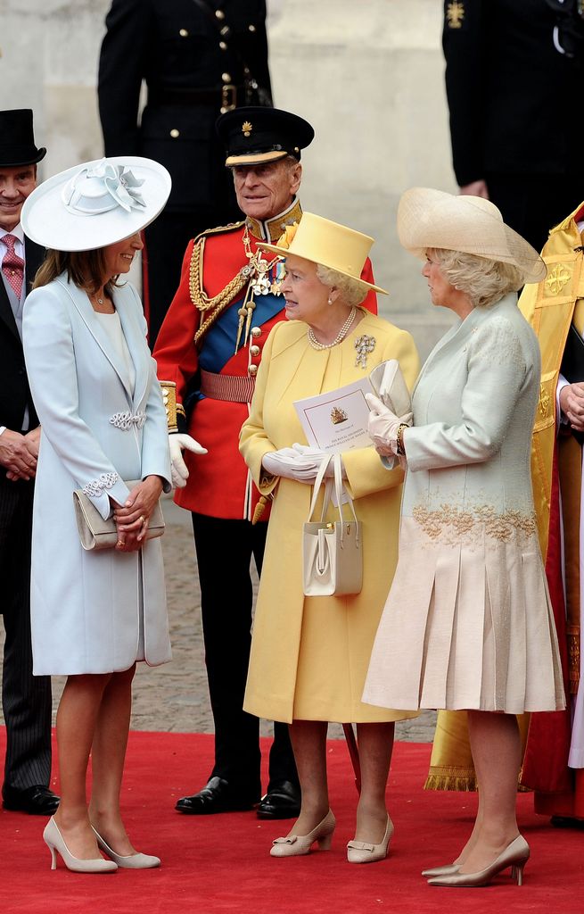 Carole Middleton talking to Prince Philip, Duke of Edinburgh, Queen Elizabeth II and Camilla, Duchess of Cornwall after the royal wedding