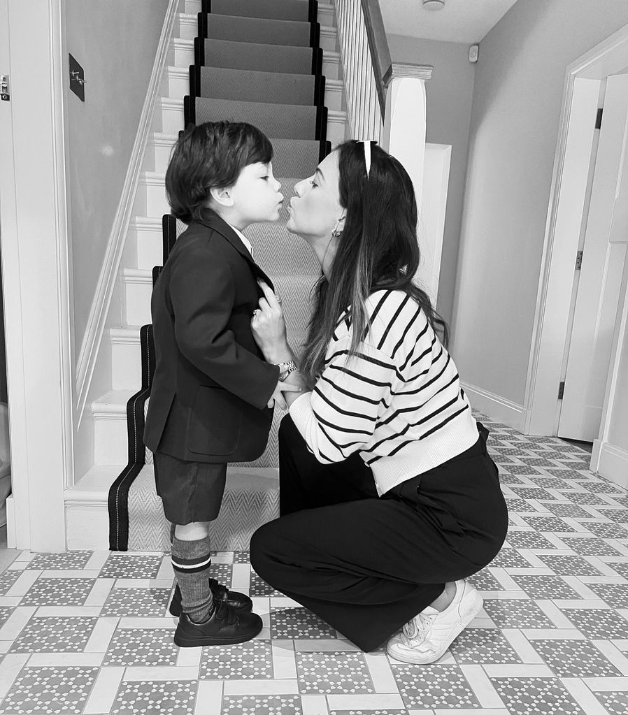 Lucy Mecklenburgh kissing son Roman in family hallway