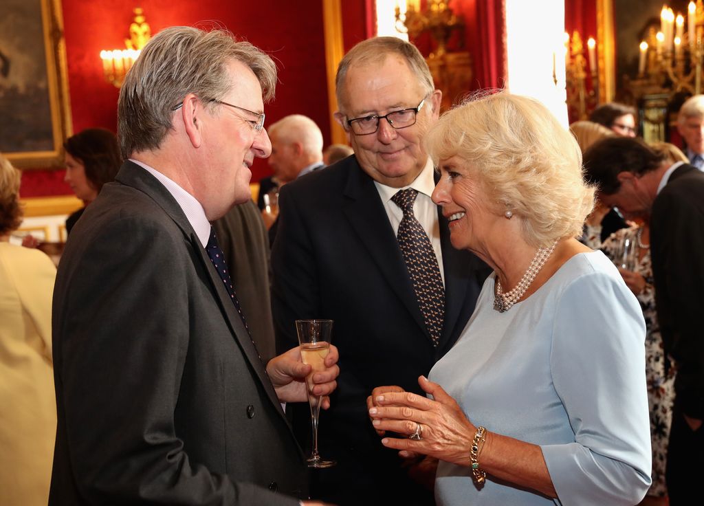 Queen Camilla talking to author Robert Hardman in St James Palace in 2016 