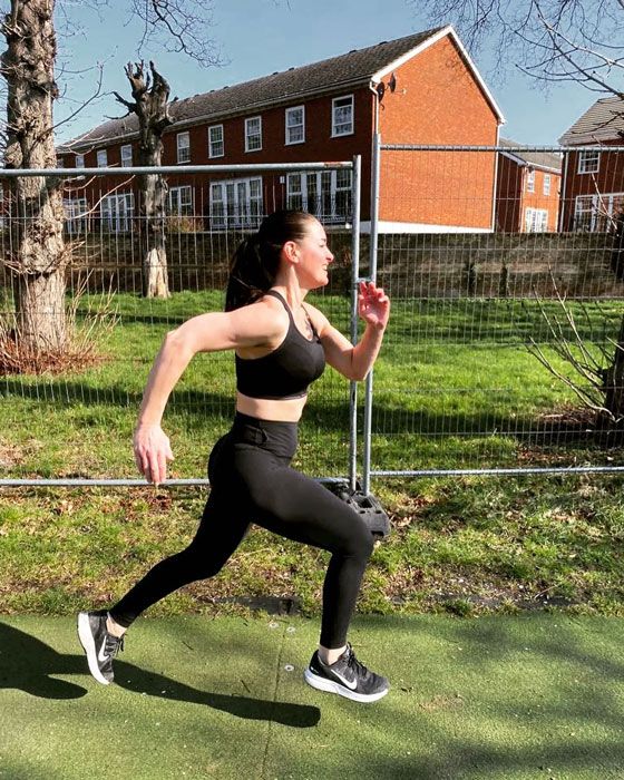 Kirsty Gallacher works out in just sports bra in steamy session