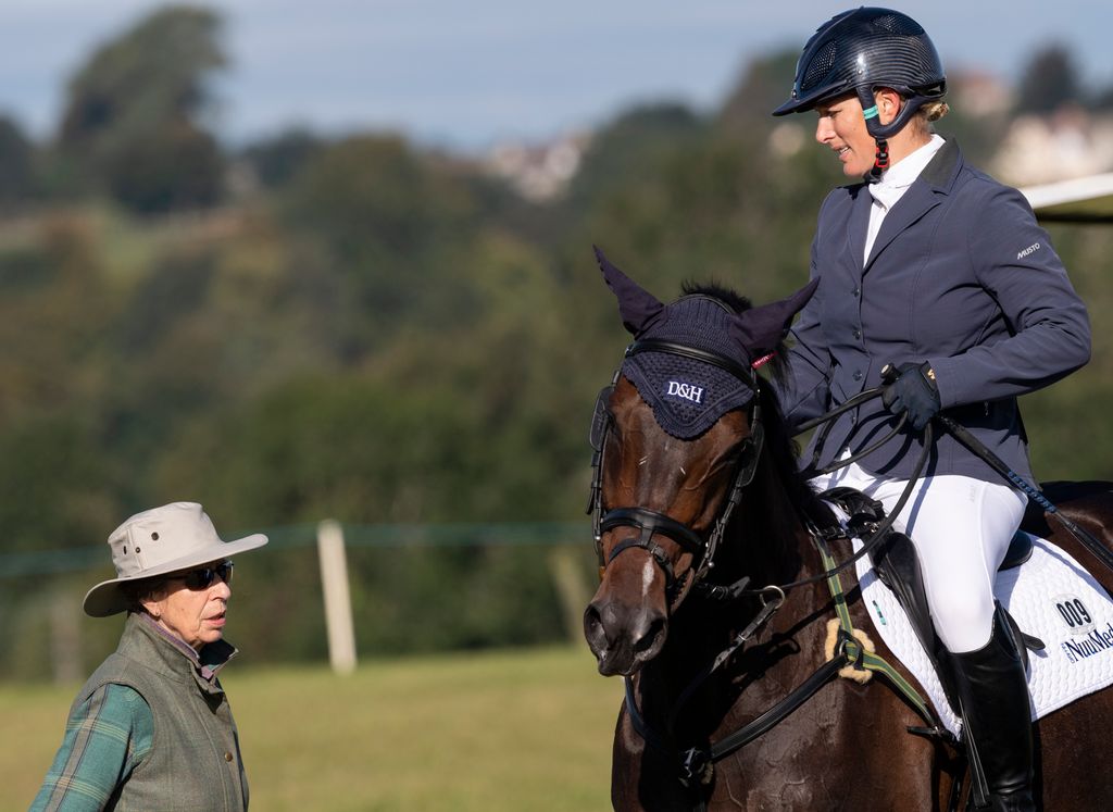 Princess Anne talking to Zara Tindall on Gladstone at The Gatcombe Horse Trials at Gatcombe Park on September 15, 2019 in Stroud, England
