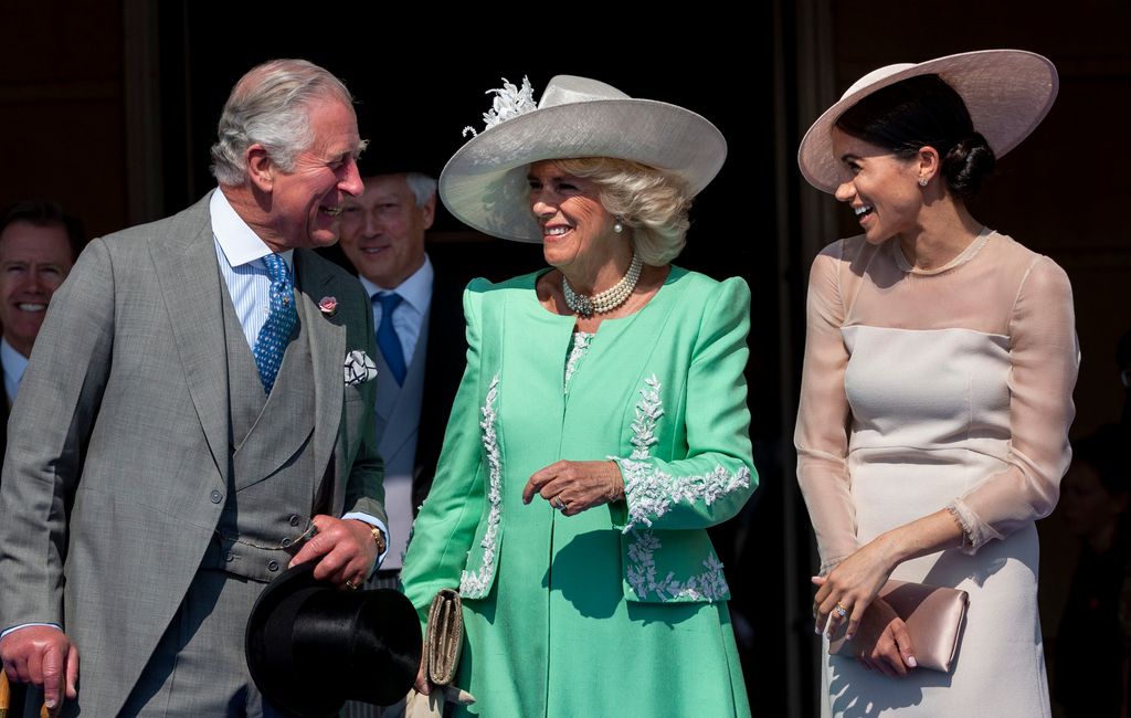 Prince Charles, Prince of Wales and Camilla, Duchess of Cornwall with Meghan, Duchess of Sussex during The Prince of Wales' 70th Birthday Patronage Celebration held at Buckingham Palace on May 22, 2018 in London
