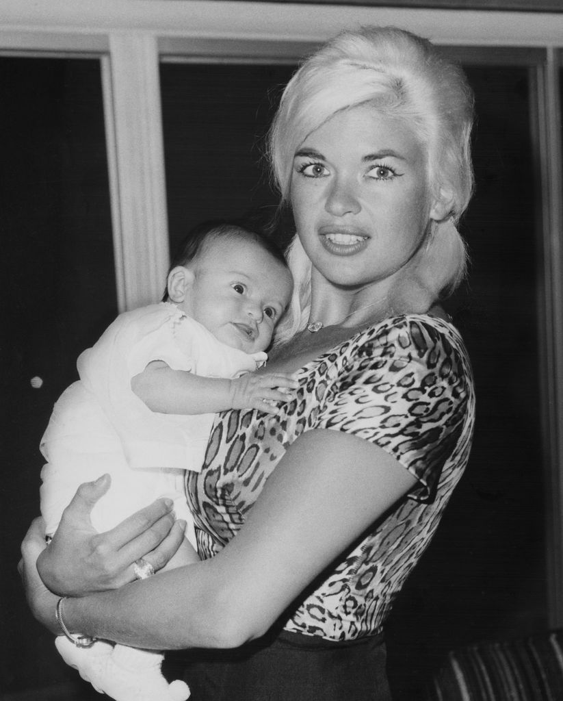 Jayne Mansfield holding six-weeks old Mariska Hargitay, United States, March 1964.