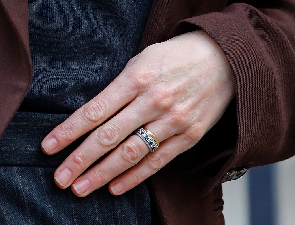 Catherine, Princess of Wales' hand up close with stacked rings