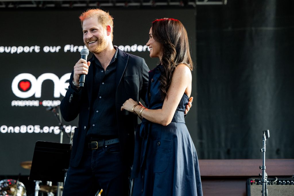 (L-R) Prince Harry, Duke of Sussex, and Meghan Markle, Duchess of Sussex attend the One805LIVE! 2025 concert 