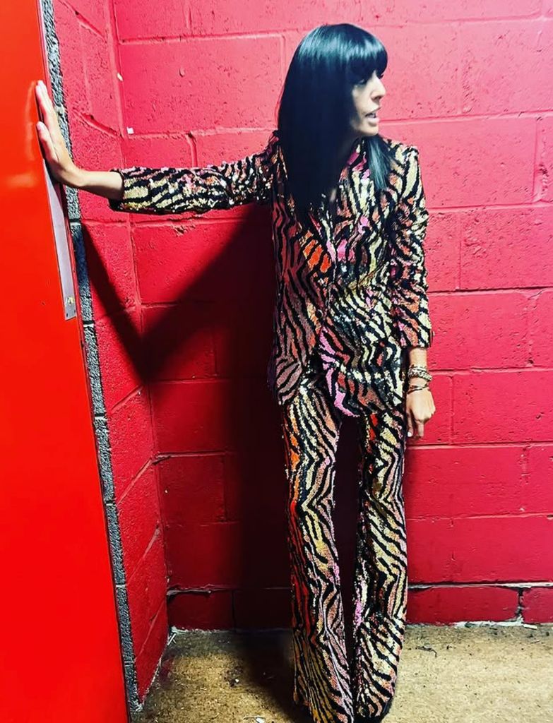 Claudia Winkleman wearing black and gold suit on Strictly Come Dancing