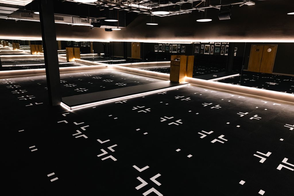 Black and lit gym floor