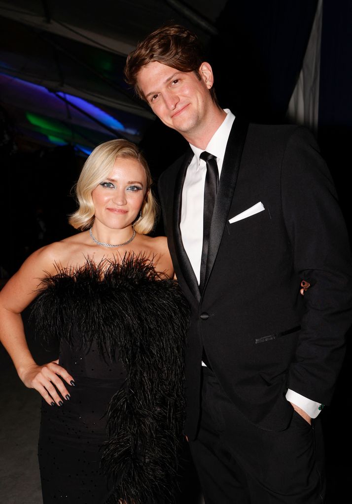 Emily Osment and her fiancé Jack Anthony pose backstage during the 28th Annual Screen Actors Guild (SAG) Awards at the Barker Hangar in Santa Monica, California, on February 27, 2022