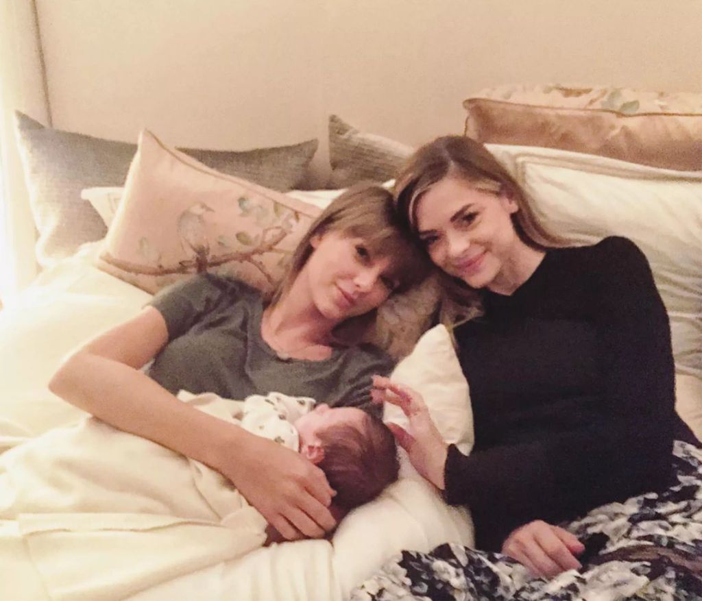 Taylor Swift holds godson Leo alongside his mother Jaime King