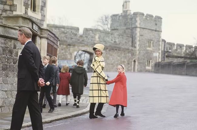Princess Diana holds Lady Rose Windsors hand on Christmas Day 1987