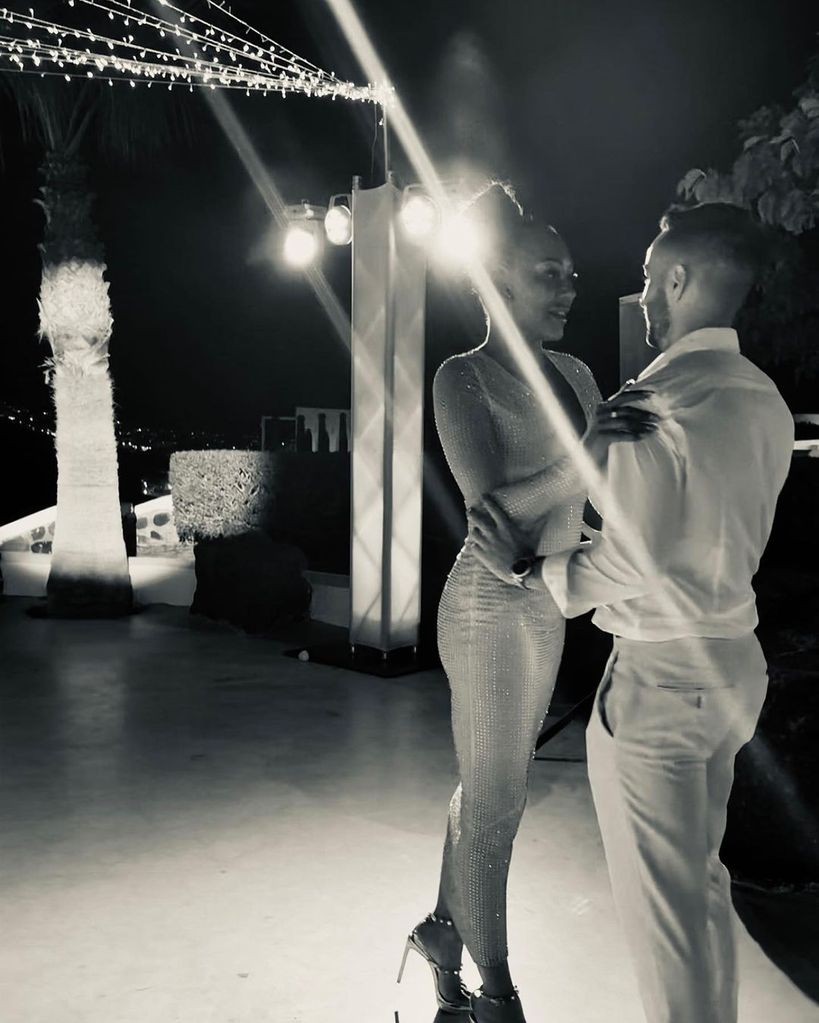 Mel B and her fiance Rory dancing at night