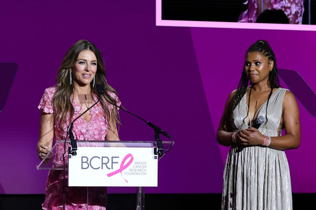 Elizabeth Hurley and Toks Olagundoye speak onstage during the Breast Cancer Research Foundation Hot Pink Party 2025 