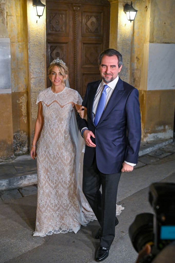 Prince Nikolaos of Greece and his wife Chrysa Vardinogianniis following their wedding ceremony