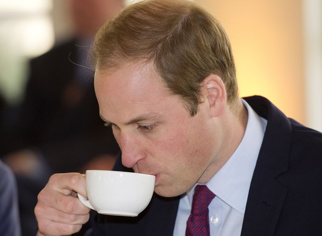 Prince William drinking a cup of tea