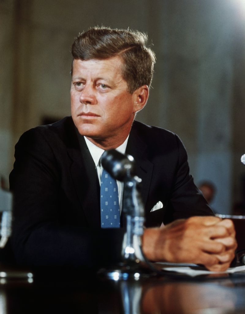 President John F. Kennedy at his desk in the White House on his first day in office as President of the United States in 1960.