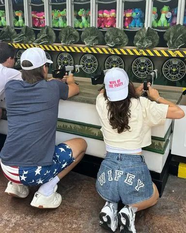 Millie dons shorts emblazoned with 'wifey' for post wedding vacation in Orlando