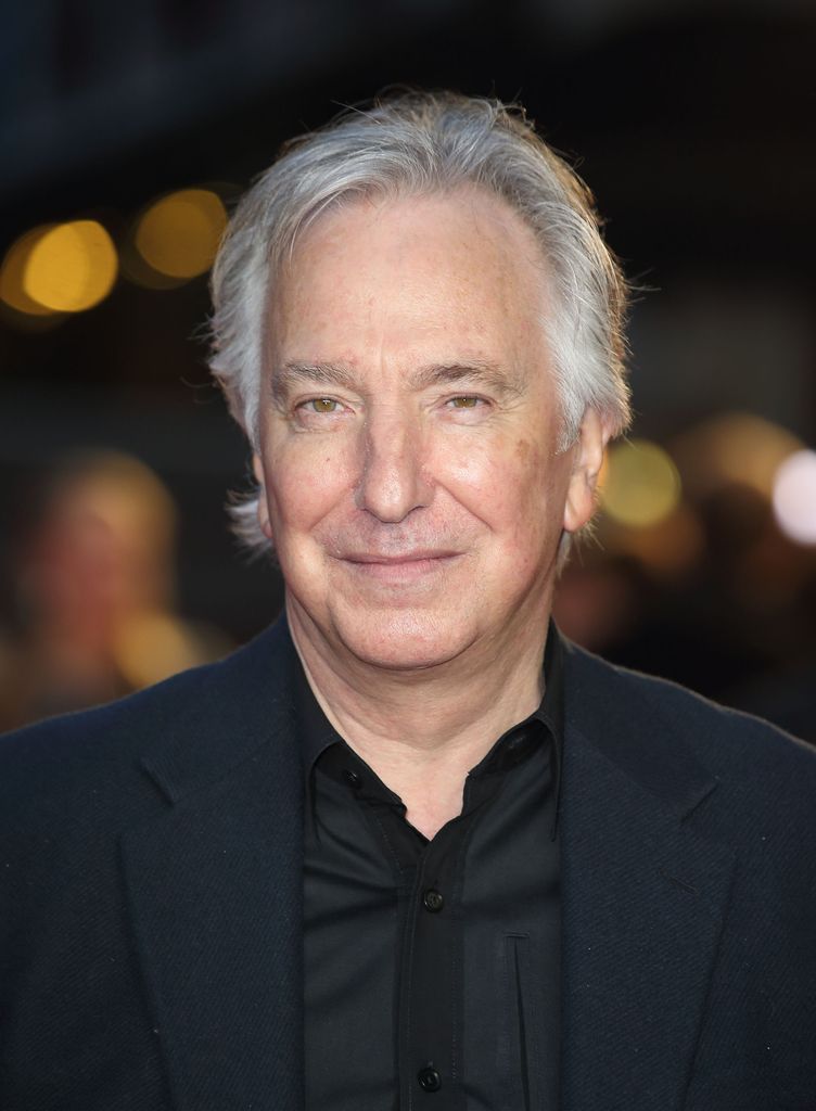 Alan Rickman smiling at a red carpet event